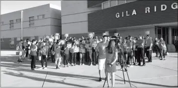  ?? PHOTO COURTESY OF YUHSD ?? PARTICIPAN­TS IN THE #RedforEd campaign gather at Gila Ridge High School on Wednesday.