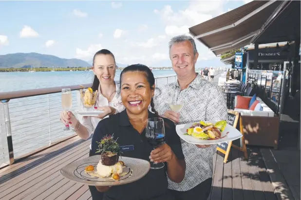  ?? Picture: ANNA ROGERS ?? TASTE TEMPTERS: Ochre general manager, Carley Elsum, Gemma Tweeddale from Dundees, and Ochre owner Craig Squire prepare for the Long Lunch.