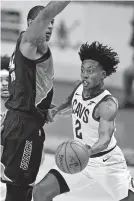  ?? [AP PHOTO/ TONY DEJAK] ?? Collin Sexton, right, was the eighth overall pick in the 2018 draft by the Cavalier. He's averaging 22.9 points per game this season.