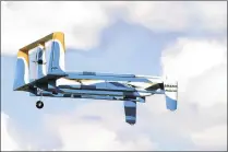  ?? NEW YORK TIMES ?? Amazon has partnered with the British government to significan­tly expand testing of drones, like this one. Britain’s air regular will let the company test several aspects of drone technology. An ultimate goal would be to make a delivery in 30 minutes.