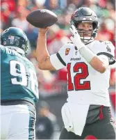  ?? DIRK SHADD TAMPA BAY TIMES ?? Tom Brady was 29 of 37 for 271 yards with two TDs and no intercepti­ons against the Eagles on Sunday.