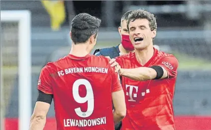  ?? FOTO: EFE ?? Lewandowsk­i y Müller reaparecen