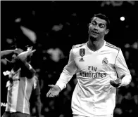  ?? JAVIER BARBANCHO / REUTERS ?? Cristiano Ronaldo reacts after following up his saved penalty to score Real Madrid’s winner in its 3-2 league victory over Malaga at Santiago Bernabeu in Madrid on Saturday.