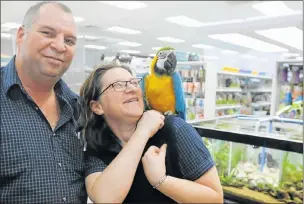  ?? Picture: FREDLIN ADRIAAN ?? BIG PLANS: Danie and Christel Bothma with one of their many pets for sale