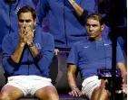  ?? PHOTO: REUTERS ?? Roger Federer (left) with Rafael Nadal at the end of his last match after announcing his retirement.