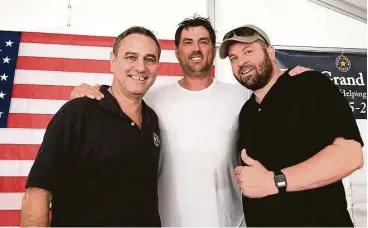  ??  ?? From left are Gary Sumner, managing partner at Texas Grand Ranch; Marcus Luttrell, founder of Lone Survivor Foundation; and Michael Berry, radio host for KTRH Houston.