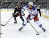  ?? PAUL VERNON — THE ASSOCIATED PRESS FILE ?? Rangers defenseman Ryan McDonagh, right, looks to pass during game against Blue Jackets. New York traded McDonagh and J.T. Miller to Tampa Bay.