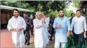  ?? PTI ?? Janata Dal (United) leader Nitish Kumar with Rashtriya Janata Dal leaders Tejashwi Yadav and Tej Pratap, in Patna on Tuesday