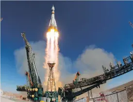  ?? RUSSIAN DEFENCE MINISTRY PRESS SERVICE PHOTO VIA THE ASSOCIATED PRESS ?? The Soyuz MS-10 blasts off in Kazakhstan on Thursday. The rocket made it about halfway to space before a breakdown forced the crew to make an emergency landing.