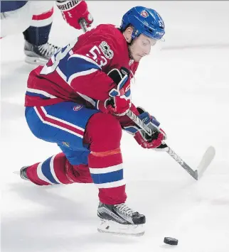  ?? ALLEN McINNIS ?? Habs’ rookie defenceman Victor Mete keeps his eye on the puck during preseason action against the Washington Capitals. The 19-year-old is a strong skater who moves the puck well, something he attributes to trying to keep up with his figure skating...