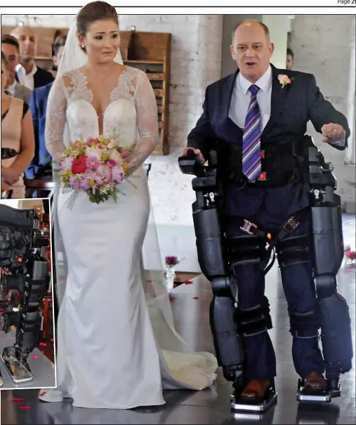  ??  ?? Wedding day: Chris Palmer gives away daughter Heather, 28, using a £90,000 robotic suit, inset, which is controlled by joystick