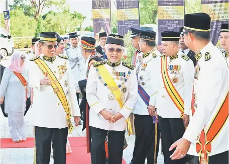  ??  ?? The Yang di-Pertua Negeri (front, second left) being welcomed by Chief Minister Datuk Patinggi Abang Johari Tun Openg (on TYT’s right) upon his arrival at DUN Complex in Petra Jaya. Behind them are Taib’s wife Toh Puan Datuk Patinggi Raghad Kurdi Taib (behind Abang Johari, partly obscured) and the chief minister’s wife Datin Patinggi Dato Juma’ani Tuanku Bujang (far back, at left). — Photo By Chimon Upon
