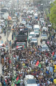  ?? — AFP photo ?? Supporters of Pakistan Peoples Party (PPP) attend an election campaign rally in Karachi ahead of the national elections.