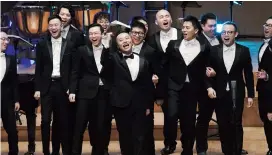  ??  ?? Rainbow Chamber Singers — Ti Gong