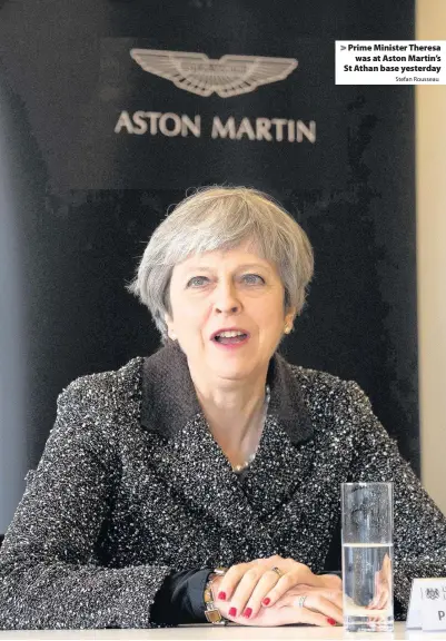  ?? Stefan Rousseau ?? > Prime Minister Theresa was at Aston Martin’s St Athan base yesterday