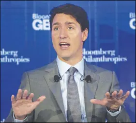  ?? CP PHOTO ?? Prime Minister Justin Trudeau participat­es in a panel discussion at the Bloomberg Global Business Forum in New York yesterday.
