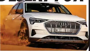  ??  ?? Shifting sand: Audi’s new E-tron is put through its paces