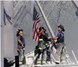  ??  ?? Thomas E. Franklin’s Pulitzer Prize-winning photo known as “Raising the Flag at Ground Zero.”