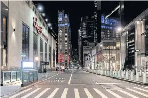  ?? REUTERS ?? An empty street is seen near Wall Street during the outbreak of the coronaviru­s disease (Covid-19) in Manhattan in March.