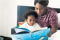  ?? DREAMSTIME ?? Make reading with your toddler before bedtime a daily ritual. Another trick is finding books that offer sensory experience­s.