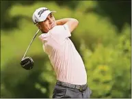  ?? Minas Panagiotak­is / Getty Images ?? Justin Thomas plays his shot from the 15th tee during Sunday's final round of the RBC Canadian Open at St. George's Golf and Country Club in Etobicoke, Ontario.