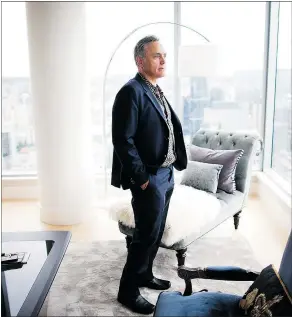  ?? — RAFAL GERSZAK/FOR NATIONAL POST ?? Developer Bruce Langereis takes in the view from the $18-million luxury penthouse that has sat empty in downtown Vancouver since its completion in 2012.