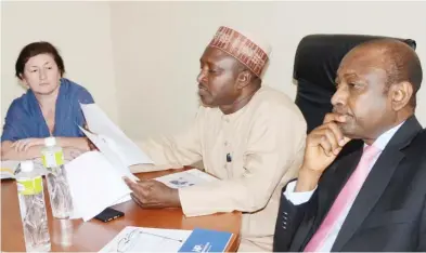  ?? Photo: NAN ?? From left: Director, Heath Palladium USA, Iryud Resherskd; representa­tive of Secretary FCT Hospital Management Board, Alhaji Surajo Faskari; and General Manager of the Board, Dr Aminu Mai, during the inaugurati­ons of FCT Health Financing Technical...