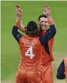  ?? ?? Pace bowler Paul van Meekeren celebrates taking a wicket for the Netherland­s against Scotland