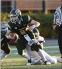  ?? PETE BANNAN — MEDIANEWS GROUP FILE ?? Bonner-Prendie quarterbac­k
Shane Mulholland, seen driving for a touchdown earlier this season, against Cardinal O’Hara, had a touchdown pass Friday night but it was the only score for the Friars in a 14-7loss to Bishop Shanahan.