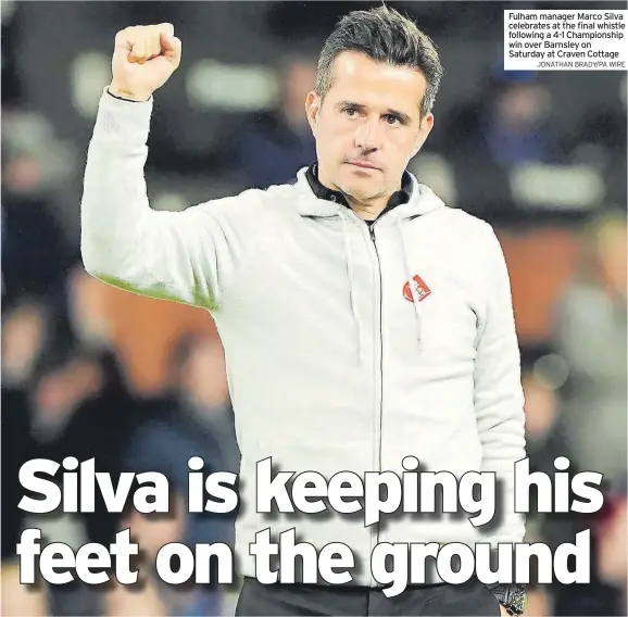  ?? JONATHAN BRADY/PA WIRE ?? Fulham manager Marco Silva celebrates at the final whistle following a 4-1 Championsh­ip win over Barnsley on Saturday at Craven Cottage