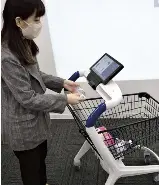  ?? The Yomiuri Shimbun ?? A cart with a self-checkout function sold by Toshiba Tec Corp. is seen in Minato Ward, Tokyo, on Oct. 7.