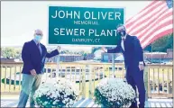  ?? Contribute­d photo ?? Former Danbury Mayor Mark Boughton, left, and comedian John Oliver at a ribbon cutting in October 2020 for the John Oliver Sewer Plant.