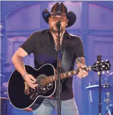  ?? NBC, VIA AP ?? Jason Aldean performs I Won’t Back Down on the opening of Saturday Night Live as a tribute to the Las Vegas victims and to rock legend Tom Petty, who died the same week.