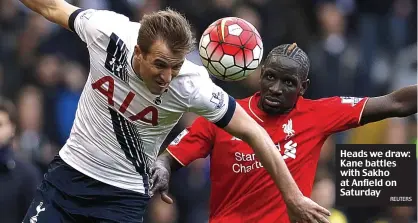  ??  ?? Heads we draw: Kane battles with Sakho at Anfield on Saturday