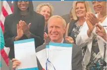  ?? | MITCH DUDEK/ SUN- TIMES ?? Gov. Bruce Rauner was in Chicago Monday to sign several criminal justice reform measures.