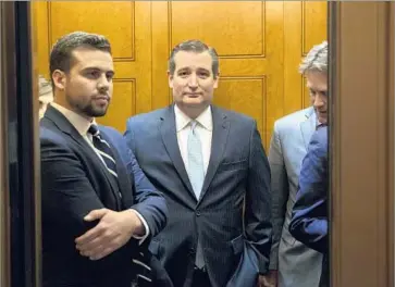  ?? Michael Reynolds European Pressphoto Agency ?? SEN. TED CRUZ of Texas, center, is one of five GOP senators who have publicly said they won’t support the healthcare measure as written. The defection of just three Republican­s would be enough to sink the bill.