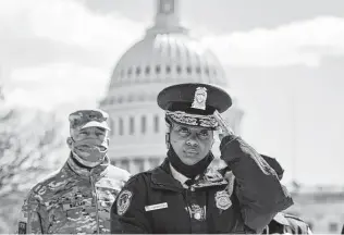  ?? Drew Angerer / Getty Images ?? Yogananda Pittman, acting chief of the U.S. Capitol Police, said an attacker who rammed his car into two Capitol Police officers did not appear to have been on the police’s radar.