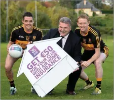  ??  ?? Brian Looney and Colm Cooper from Dr Crokes with Sean Healy, AIB Regional Director launch AIB’s new GAA Club Reward Scheme at Dr Croke’s grounds in Killarney.