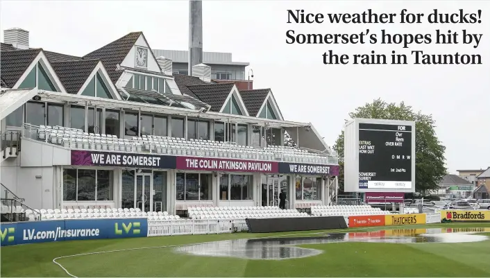  ?? David Davies ?? > Puddles form on the outfield as rain delays the start of play on day one of the County Championsh­ip match between Somerset and Surrey