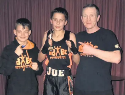  ??  ?? Macclesfie­ld Boys’ Boxing Club’s Noel Straw, Joe Straw and Sean White
