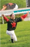  ?? ?? Olivier Doleuze plays up to the Sha Tin crowd after Good Ba Ba’s win in the 2009 Group One Hong Kong Mile.