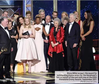  ?? (Phil McCarten/AP/SIPA) ?? Bruce Miller accepts the award for outstandin­g drama series for The Handmaid's Tale on behalf of the cast and crew at the 69th Primetime Emmy Awards, September 2017.