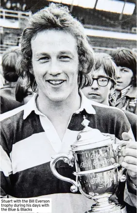  ??  ?? Stuart with the Bill Everson trophy during his days with the Blue & Blacks
