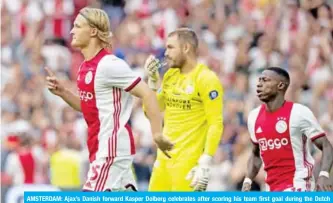  ??  ?? AMSTERDAM: Ajax’s Danish forward Kasper Dolberg celebrates after scoring his team first goal during the Dutch Super Cup football final match between Ajax Amsterdam and PSV Eindhoven at the Johan Cruijff Arena.