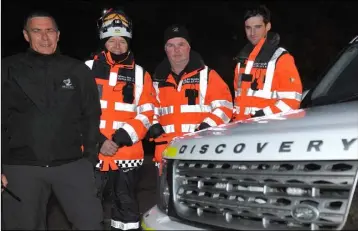  ??  ?? James Larkin, Cormac Gormley, Donal McDonald and Lee Skerritt members of the Irish Coast Guard who took part in the Torchlight Walk in aid of MS Ireland held in Carlingfor­d.