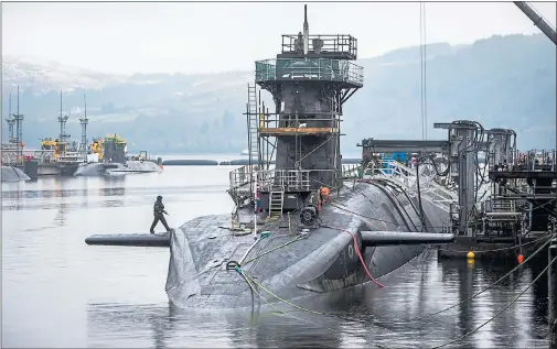  ??  ?? FASLANE: The Clyde base is currently home to seven submarines, including the UK’s nuclear deterrent and the new generation of hunter-killer class. Picture: Danny Lawson/PA