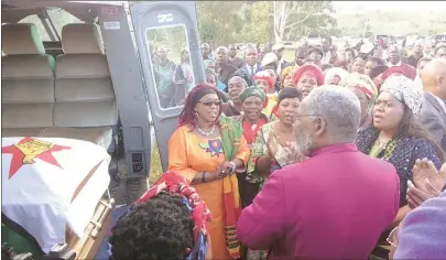  ??  ?? Government and ZANU-PF officials receive the body of national heroine Cde Victoria Chitepo at Bonda Mission grounds in Nyanga yesterday