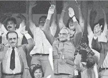  ?? CHARLES TASNADI, AP ?? Cuban leader Fidel Castro does the wave at the 1991 Games.