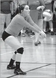  ?? Photo by Randy Moll ?? Kaylee Midyett, a Gravette junior, receives a serve during the final regular-season game against the Lady Pioneers of Gentry at Gravette High School on Oct. 12.
