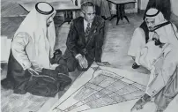  ??  ?? Sheikh Zayed bin Sultan al Nahyan (extreme left) with the man behind Abu Dhabi’s masterplan Dr Abdulrahma­n Makhlouf (centre)